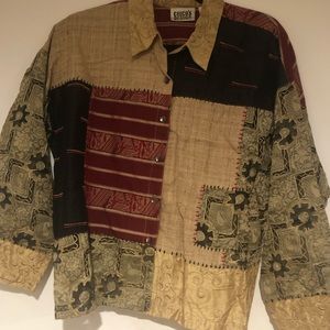 Chico’s button down color block top with embroidery detailing.  Size 1